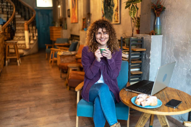 istock Woman enjoying in coffee at cafe 2183246100