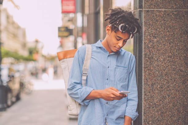 istock Young man is listening music on the move 2183246643