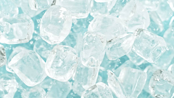 istock Freeze motion of flying ice cubes isolated on blue background. 2183248415