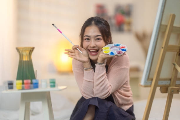 istock Woman Painting at Home Studio 2183248868