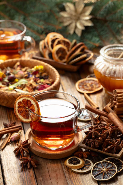istock Christmas herbal tea with ingredients on a old wooden table. 2183254027