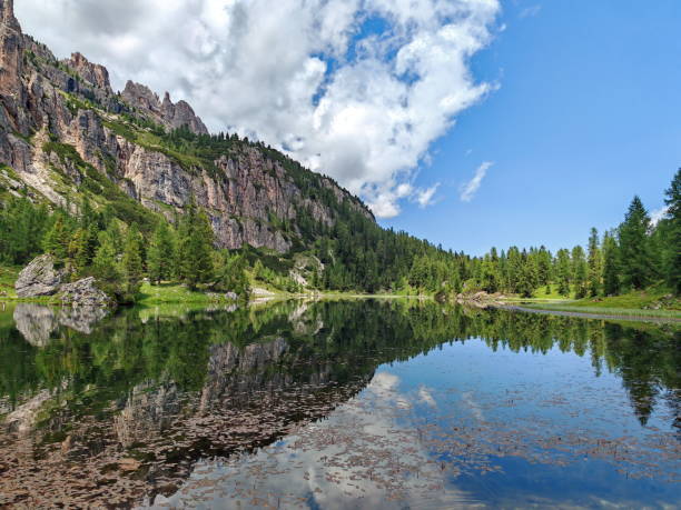 istock Tranquil the Lago de Federa mountain lake reflecting mountains and clouds under a blue sky in a serene natural landscape 2183262801