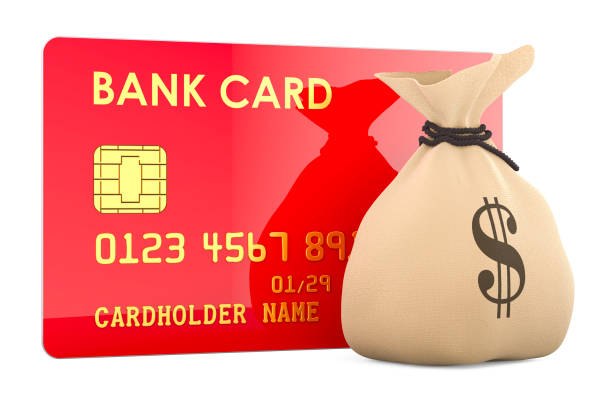 Contactless payment credit card and US dollar bills in the pocket of blue denim jeans, representing modern payment methods alongside traditional cash