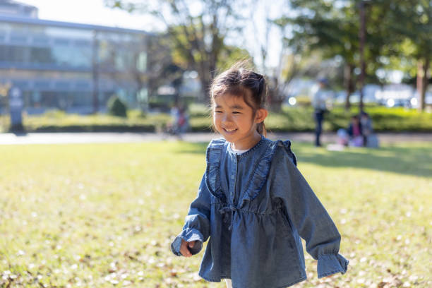 Little girl playing in public park