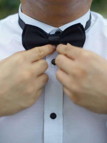 istock Professional man gestures, fine gentleman, business executive fitting to their suit and preparing for daily office job, dressing to gentleman suit good for executive magazine, executive concept 2183266035