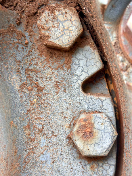 istock A rusty metal surface with a few holes and a few scratches 2183273717