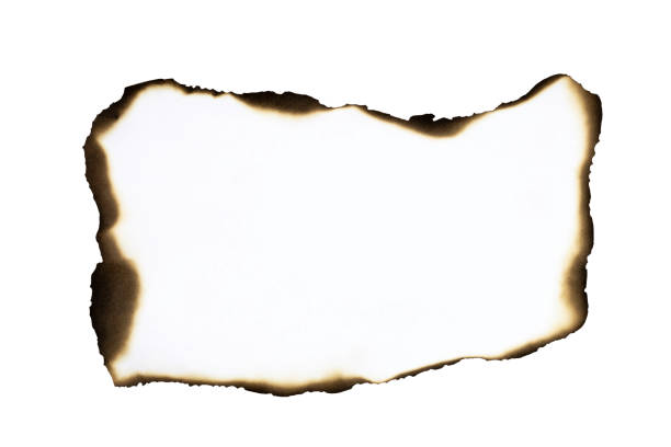 istock White paper with burnt edges isolated on white background with clipping path. 2183280674