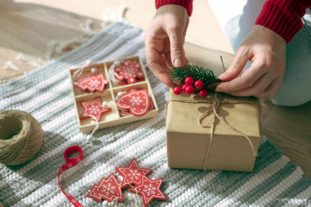 istock Woman wrapping Christmas presents 2183282504