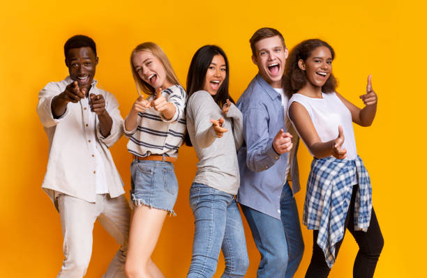 istock Cheerful multiracial group of students indicating at camera 2183283880