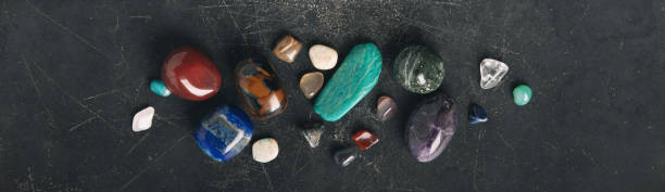 istock Mystical Flat Lay of Sage, Crystals, and Dried Herbs on Dark Surface banner 2183288005
