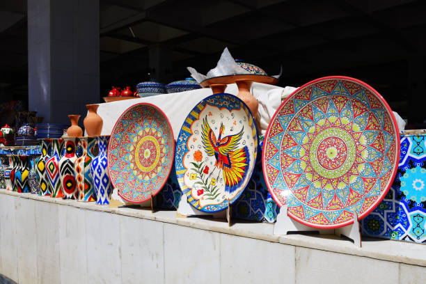 Sale of traditional Uzbek ceramic dishes and souvenirs at the Samarkand Siab bazaar