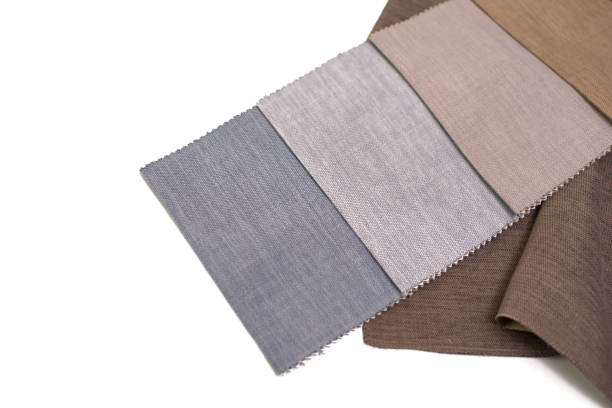 istock Fabric samples for curtains in beige, brown and blue colors on a white background. 2183288777