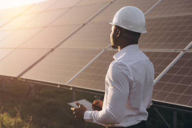 istock African American Engineer Inspecting Solar Panels at a Renewable Energy Site 2183289661