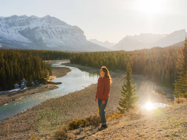 istock Woman looking at river in Canadian Rockies wilderness 2183290114