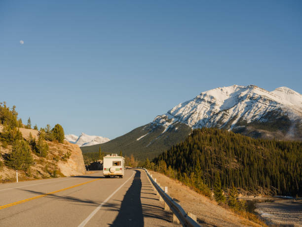 istock Camper van on road through Canadian Rockies 2183292424