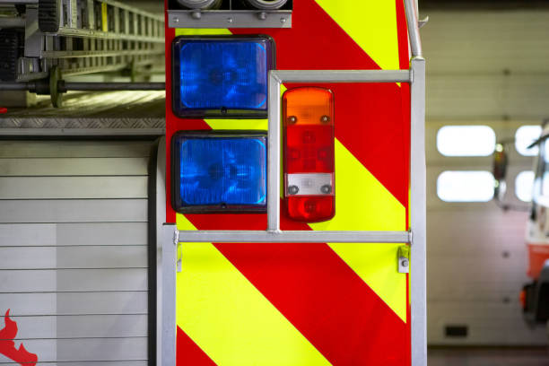 istock Fire engine detail, Fire engine, lights, ladder, emergency, colours, red, yellow, blue, rescue,  shutter doors, back of fire eng 2183298304