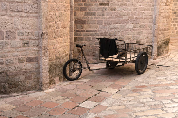 istock Loading tricycle in the medieval city of Kotor 2183298853
