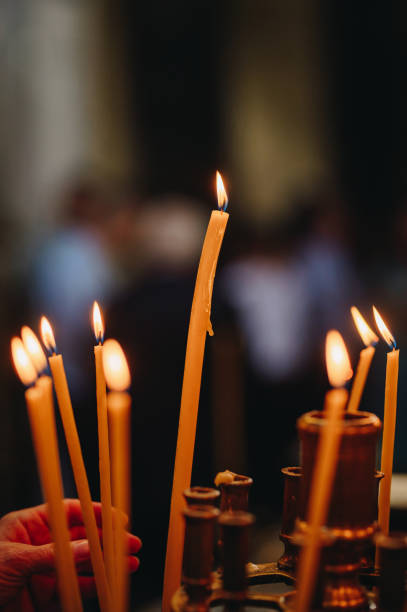 istock Candles in a church 2183300879