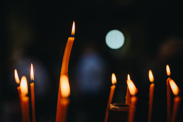 istock Candles in a church 2183300897
