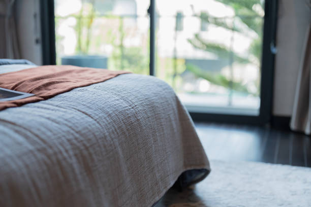 istock Low angle view of bedroom bed 2183302276