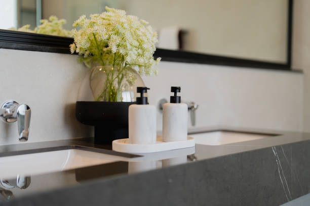 Dispenser with white liquid soap or shower gel, for intimate hygiene. Moisturizing, cleansing