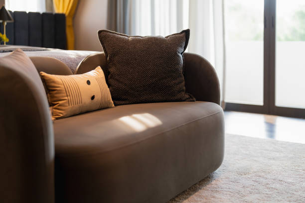 istock A modern designed sofa Pillows And Cushions On Sofa Stylish colorful cushions on couch in living room 2183302631