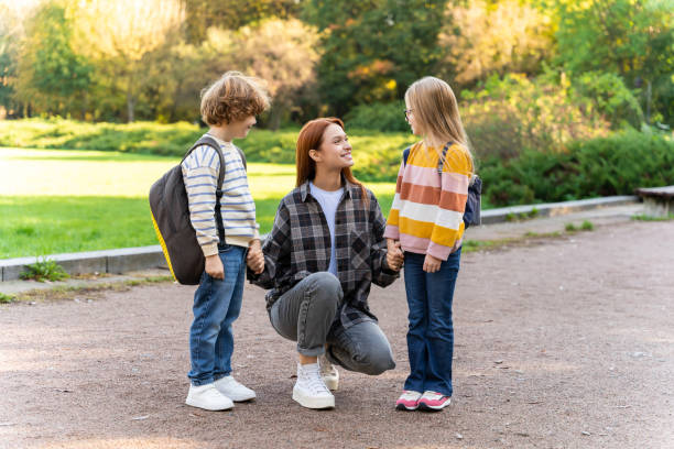 istock Friends feeling great together during happy walk in park 2183303541