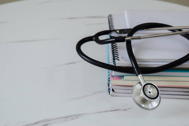 istock Concept of medical college student with stack of books 2183306099