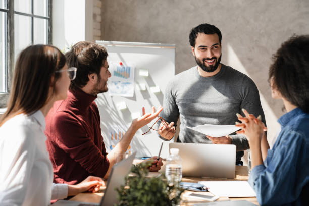 istock Professionals in diverse group collaborate in boardroom engaging in lively brainstorming session 2183307884