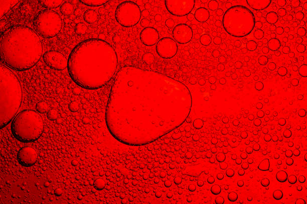 istock Red macro drink foam,Red Macro Drink Bubbles,Red macro bubble texture,Macro red bubble texture close-up,red macro bubbles,Backgrounds, Abstract Backgrounds, Soda, Red, Carbonated,Beauty concept 2183313922