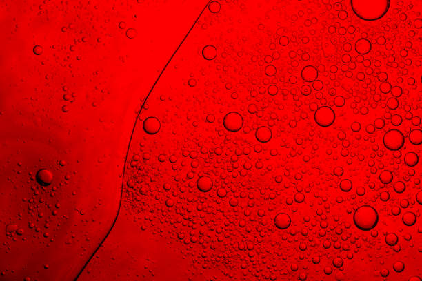 istock Red macro drink foam,Red Macro Drink Bubbles,Red macro bubble texture,Macro red bubble texture close-up,red macro bubbles,Backgrounds, Abstract Backgrounds, Soda, Red, Carbonated,Beauty concept 2183313924