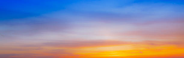 istock Blurred sky background,Sunset Sky Background,Sunrise cloud Orange,Background formed by a bright pastel authentic sky during sunset. Pink, peach, blue blur elegant backdrop with empty space perfect for design . Light color 2183313978