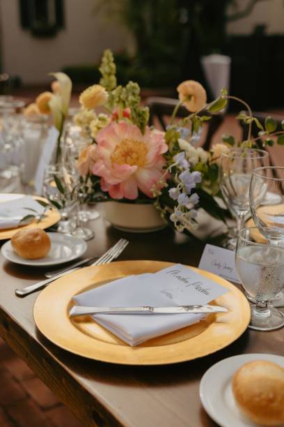 istock Elegant wedding table setting with flowers and glasses, perfect for a romantic celebration 2183314530