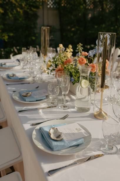 istock Elegant wedding table setting with flowers and glasses, perfect for a romantic celebration 2183314548
