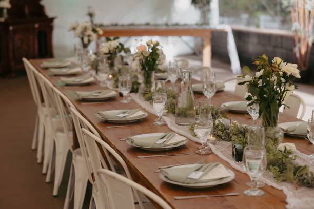 istock Elegant wedding table setting with flowers and glasses, perfect for a romantic celebration 2183314558