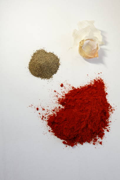 istock red paprika powder on a white surface 2183315208