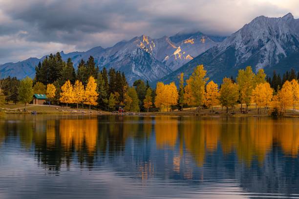 istock Autumn Trees By Quarry Lake Mountains 2183315375
