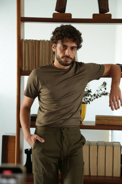 istock Transforming Male Photographic Model Styles into Dynamic Poses and Trend-Setting Outfits. 2183318169