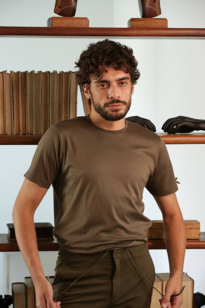 istock Transforming Male Photographic Model Styles into Dynamic Poses and Trend-Setting Outfits. 2183318207