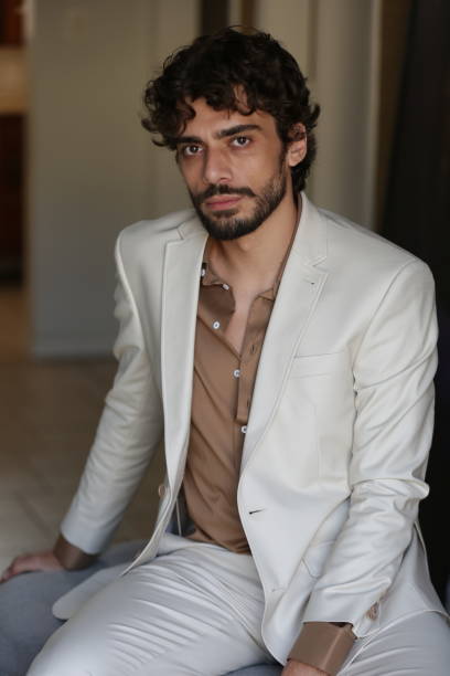 istock Transforming Male Photographic Model Styles into Dynamic Poses and Trend-Setting Outfits. 2183318754