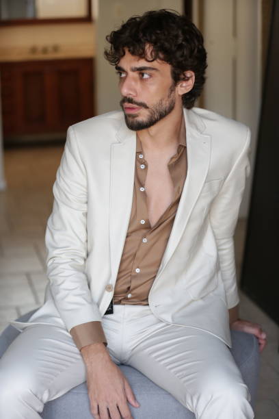 istock Transforming Male Photographic Model Styles into Dynamic Poses and Trend-Setting Outfits. 2183318930