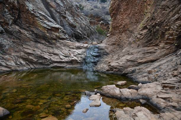 A narrow stream under rocky Wichita Mountains in Oklahoma