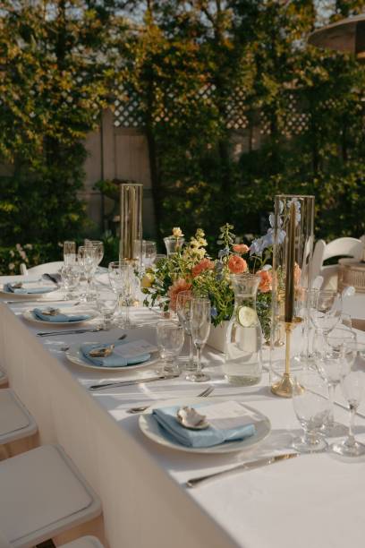 istock Elegant wedding table setting with flowers and glasses, perfect for a romantic celebration 2183320219