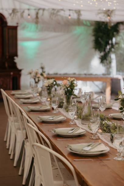 istock Elegant wedding table setting with flowers and glasses, perfect for a romantic celebration 2183320222