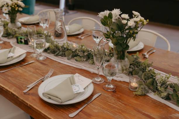istock Elegant wedding table setting with flowers and glasses, perfect for a romantic celebration 2183320244