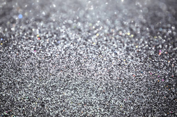 istock Silver shimmering surface shining glitter background Glowing texture Defocused bokeh 2183321295