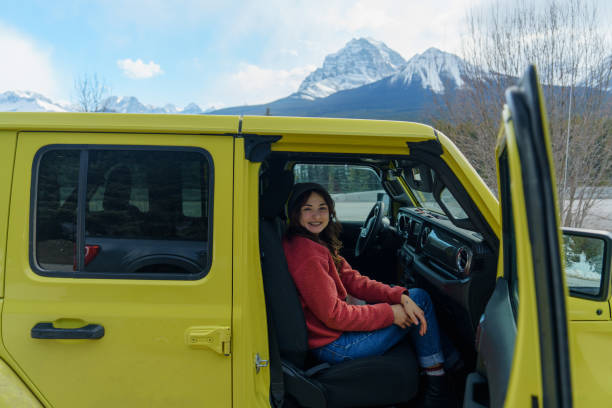 istock Passenger in SUV during road trip in mountains in winter 2183325844