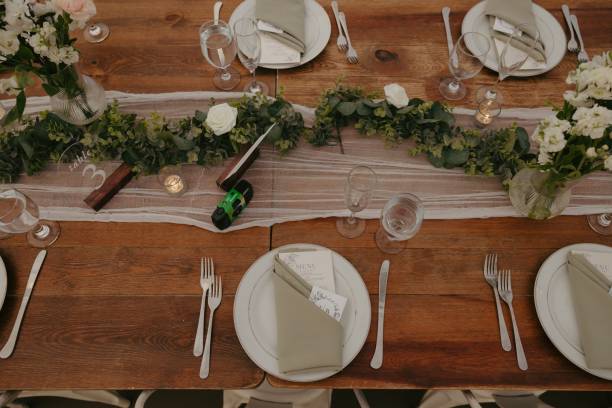 istock Long wooden table set for a wedding reception. 2183326212