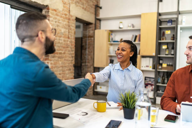 istock Business persons shaking hands on a meeting. 2183327648