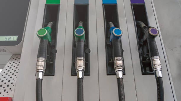 istock A gas station with four different colored gas pumps 2183329917